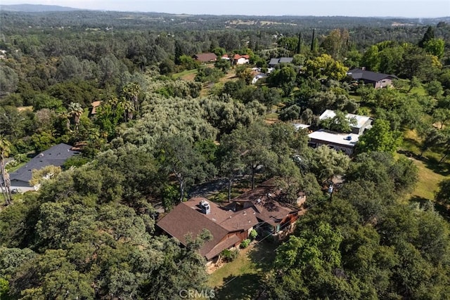 drone / aerial view with a forest view