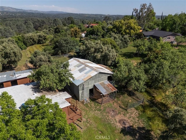 aerial view with a wooded view