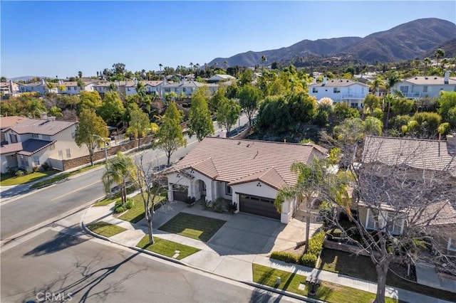 aerial view featuring a residential view and a mountain view