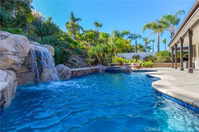 view of pool with a fenced in pool, a patio area, and a fenced backyard