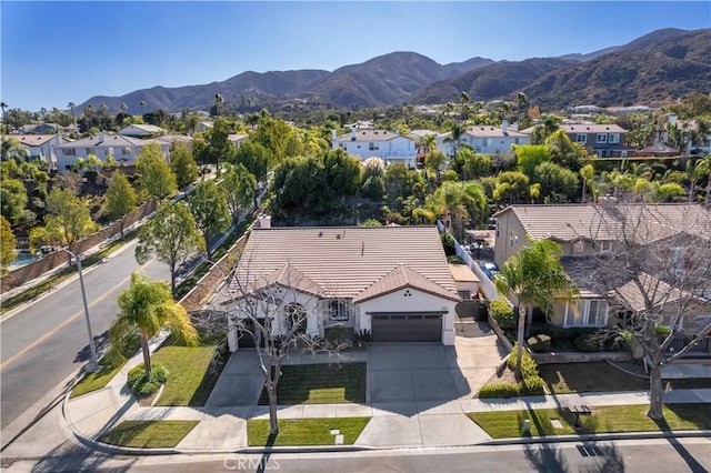 aerial view with a residential view and a mountain view