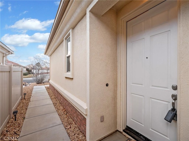 11175 Avonlea Rd, Apple Valley, CA 92308 - property entrance with stucco siding