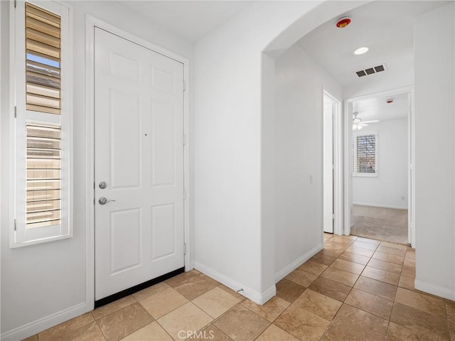 11175 Avonlea Rd, Apple Valley, CA 92308 - foyer entrance with arched walkways and ceiling fan