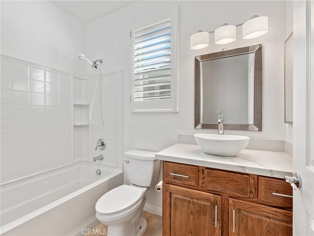 full bathroom with shower / bath combination, vanity, and toilet