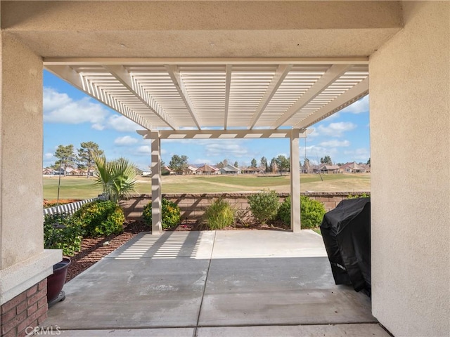 view of patio / terrace featuring grilling area and a pergola