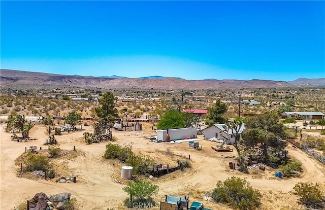 drone / aerial view featuring a mountain view