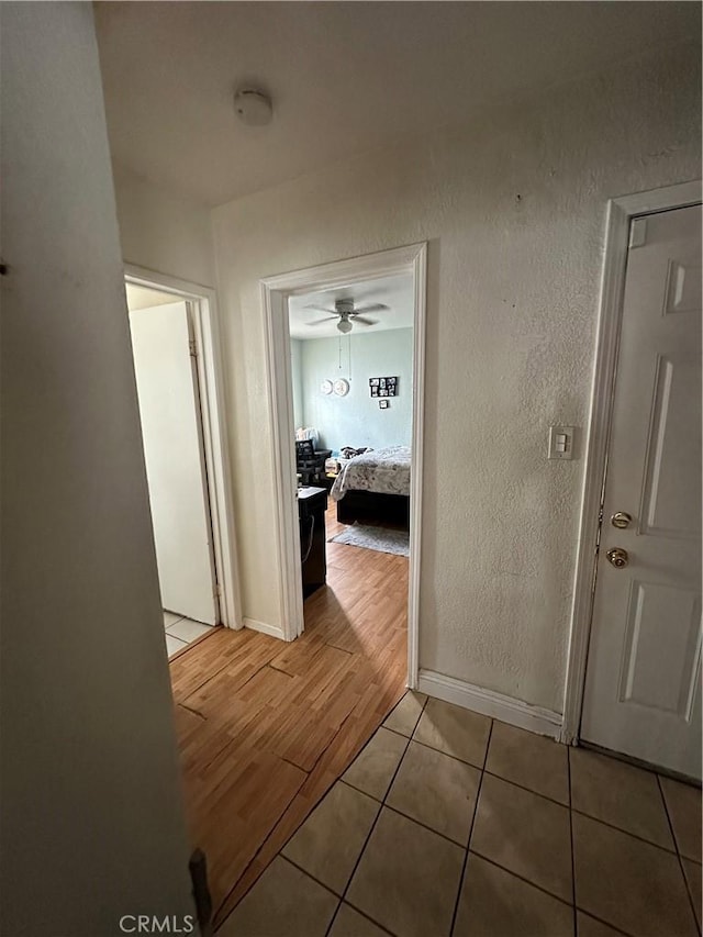 hall with light wood-type flooring