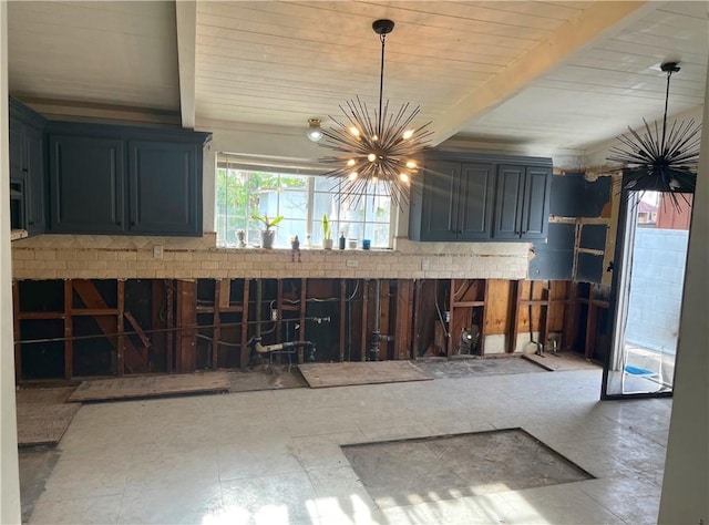 interior space with beamed ceiling and an inviting chandelier