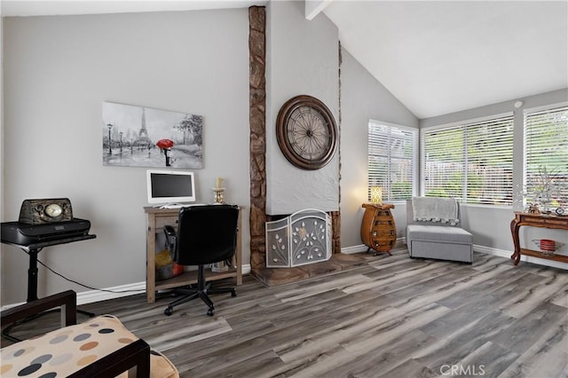 office area with beamed ceiling, baseboards, high vaulted ceiling, and wood finished floors