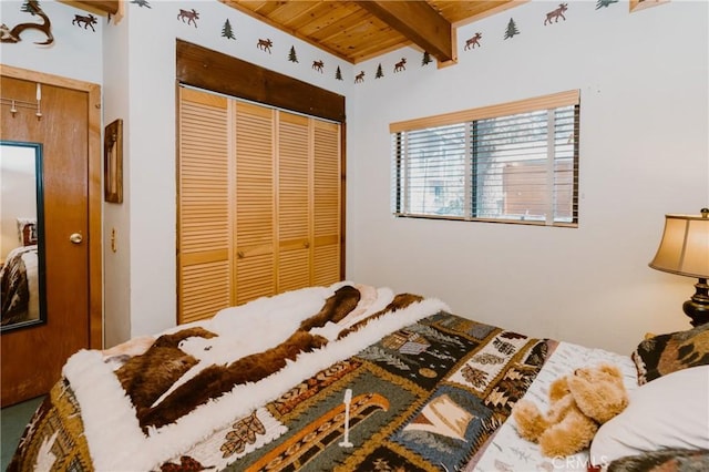 1971 Fern Ln, Big Bear City, CA 92314 - bedroom featuring beamed ceiling, a closet, and wooden ceiling