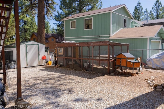 1971 Fern Ln, Big Bear City, CA 92314 - rear view of house with a storage shed