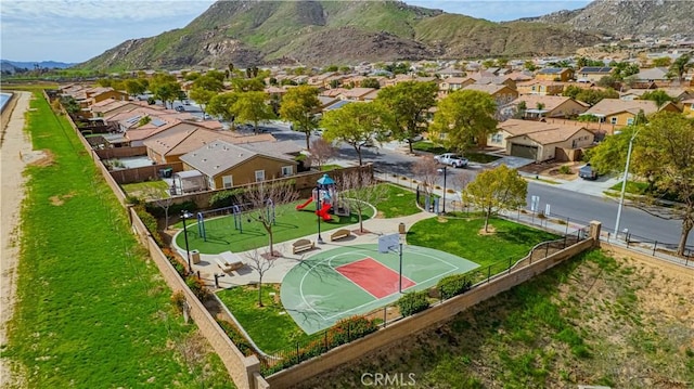 drone / aerial view with a mountain view and a residential view