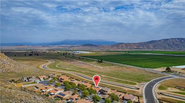 drone / aerial view with a rural view and a mountain view