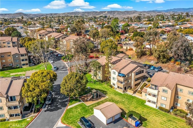 birds eye view of property featuring a mountain view