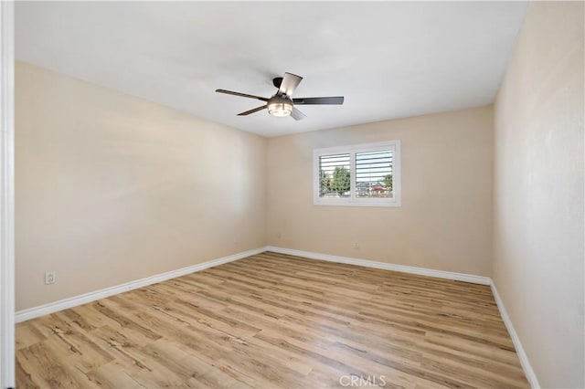 unfurnished room with ceiling fan and light hardwood / wood-style flooring