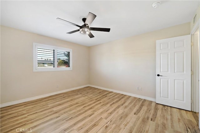 unfurnished room featuring ceiling fan and light hardwood / wood-style floors