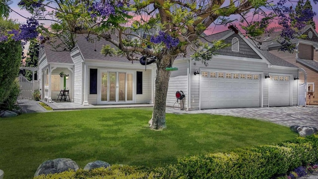 41 Baroness Ln, Laguna Niguel, CA 92677 - view of front of property with an attached garage, a shingled roof, driveway, and a front lawn