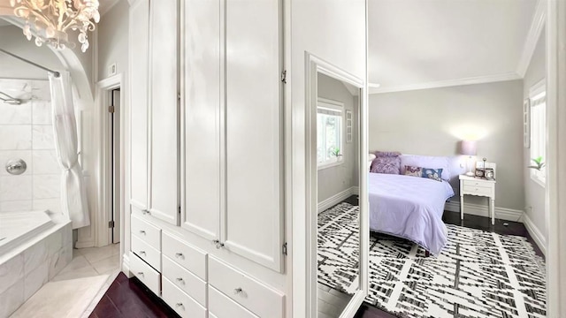 41 Baroness Ln, Laguna Niguel, CA 92677 - bedroom with an inviting chandelier, ornamental molding, and baseboards