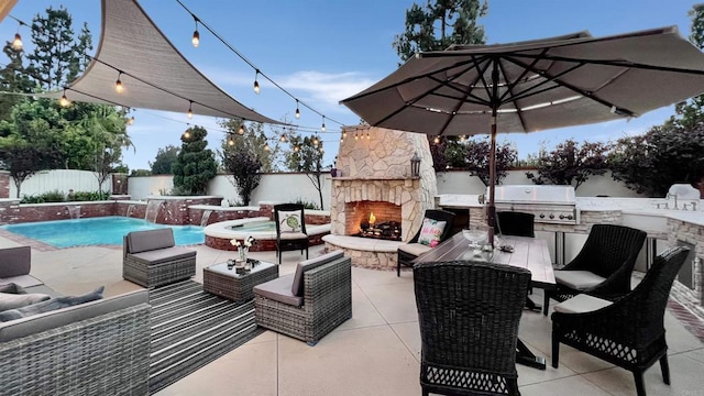 41 Baroness Ln, Laguna Niguel, CA 92677 - view of patio / terrace with area for grilling, an outdoor stone fireplace, exterior kitchen, a fenced backyard, and a fenced in pool