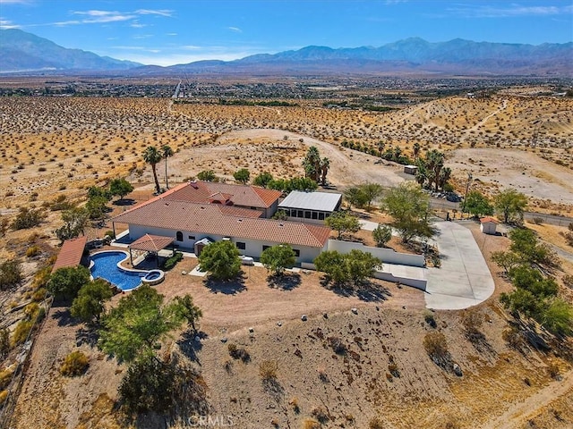 drone / aerial view featuring a mountain view