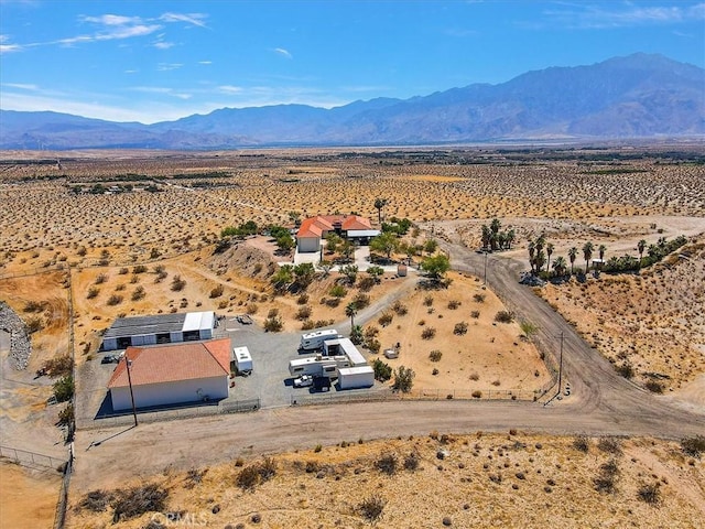 drone / aerial view featuring a mountain view