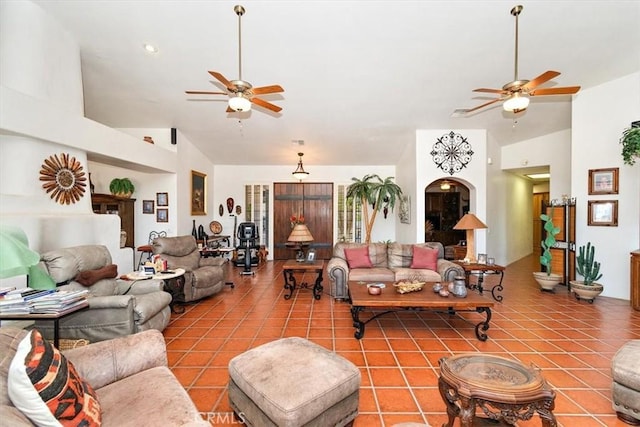 living room with tile patterned flooring, high vaulted ceiling, and ceiling fan