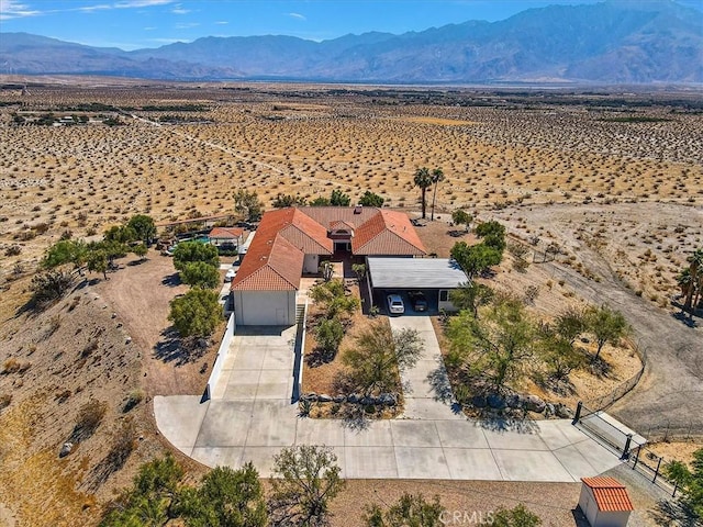 drone / aerial view featuring a mountain view