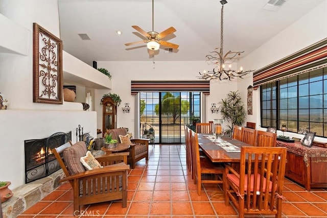 tiled dining room featuring ceiling fan