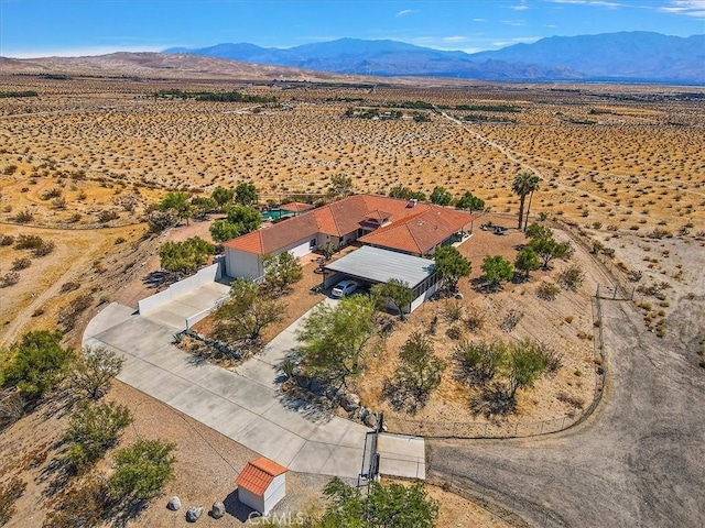 bird's eye view with a mountain view