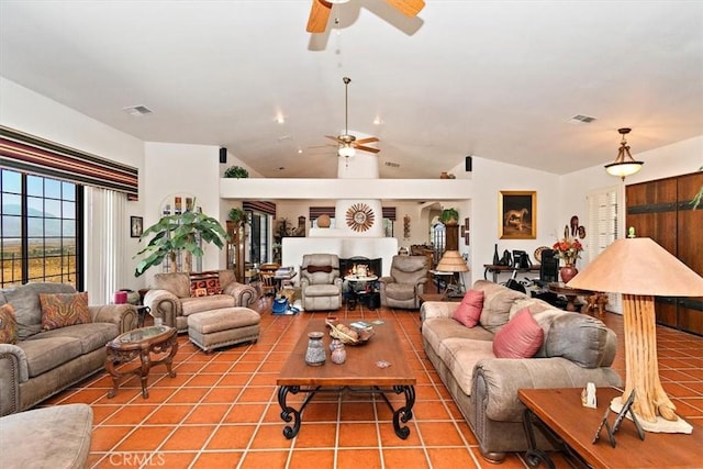 living room featuring lofted ceiling and ceiling fan