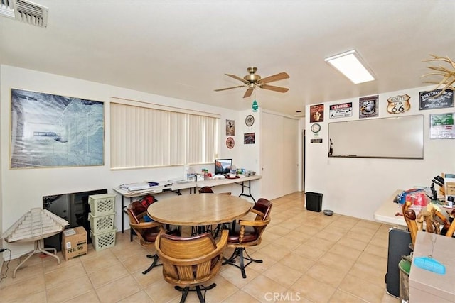 dining room with ceiling fan and light tile patterned floors