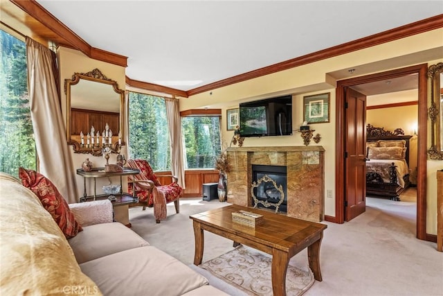 carpeted living room with crown molding and a fireplace