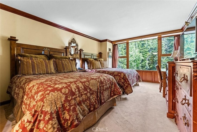 carpeted bedroom with multiple windows and ornamental molding