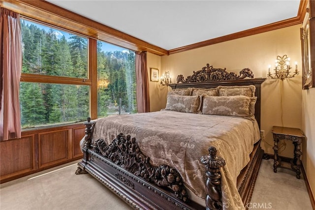 carpeted bedroom with crown molding