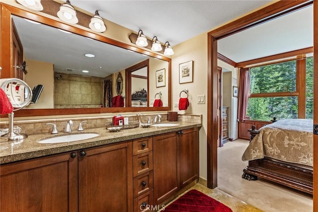 bathroom featuring vanity and walk in shower