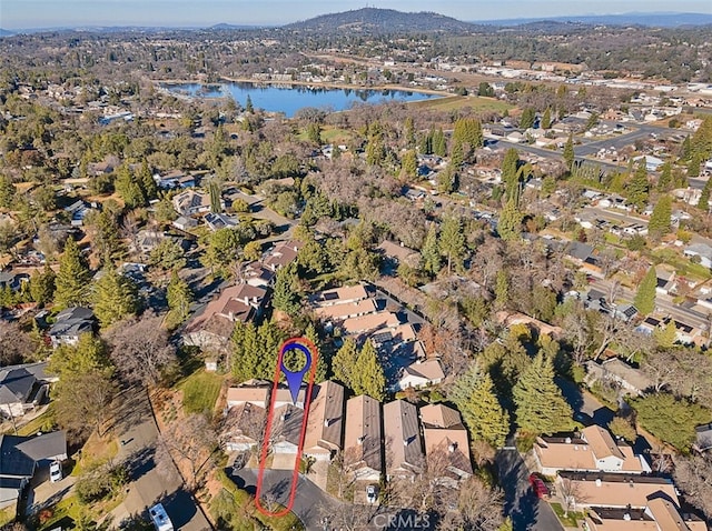 bird's eye view with a residential view and a water view