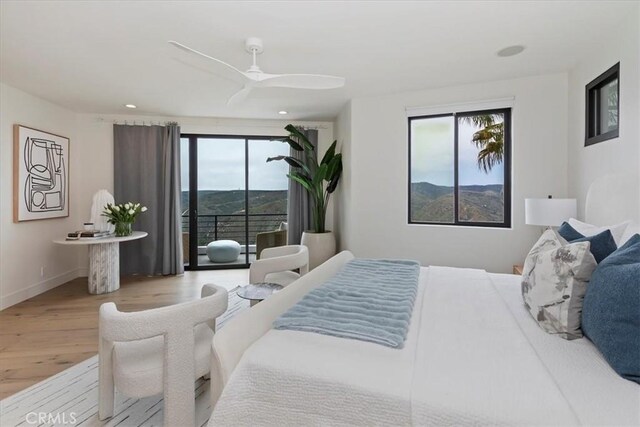 1425 Skyline Dr, Laguna Beach, CA 92651 - bedroom featuring wood finished floors, multiple windows, ceiling fan, access to outside, and recessed lighting