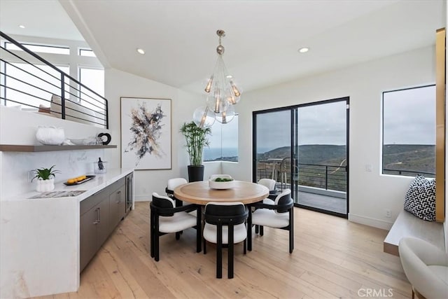 1425 Skyline Dr, Laguna Beach, CA 92651 - dining area with light wood-type flooring, a chandelier, recessed lighting, and lofted ceiling