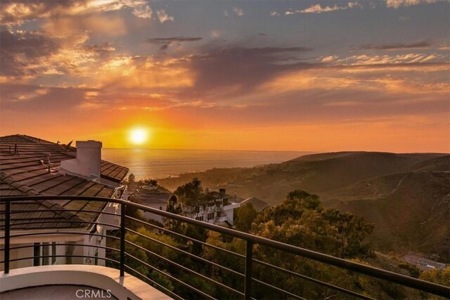 1425 Skyline Dr, Laguna Beach, CA 92651 - balcony at dusk featuring a water view