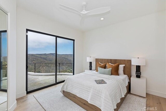 1425 Skyline Dr, Laguna Beach, CA 92651 - bedroom featuring a mountain view, wood finished floors, access to outside, recessed lighting, and a ceiling fan
