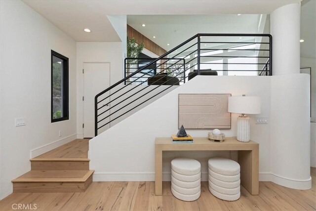 1425 Skyline Dr, Laguna Beach, CA 92651 - staircase featuring hardwood / wood-style flooring and recessed lighting