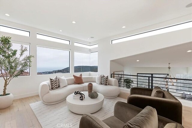 1425 Skyline Dr, Laguna Beach, CA 92651 - living area with wood finished floors and recessed lighting