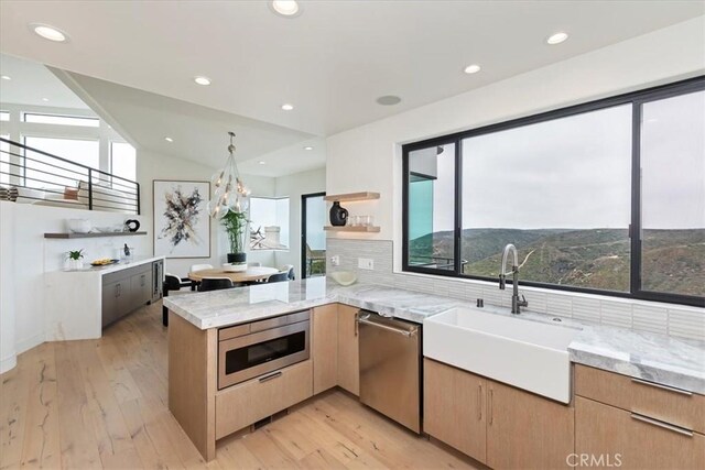 1425 Skyline Dr, Laguna Beach, CA 92651 - kitchen featuring stainless steel appliances, a peninsula, plenty of natural light, open shelves, and lofted ceiling