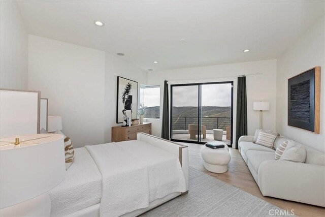 1425 Skyline Dr, Laguna Beach, CA 92651 - bedroom with wood finished floors and recessed lighting