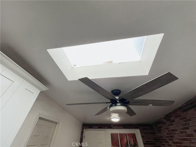 interior details featuring ceiling fan