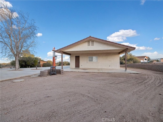 view of front of home featuring a patio