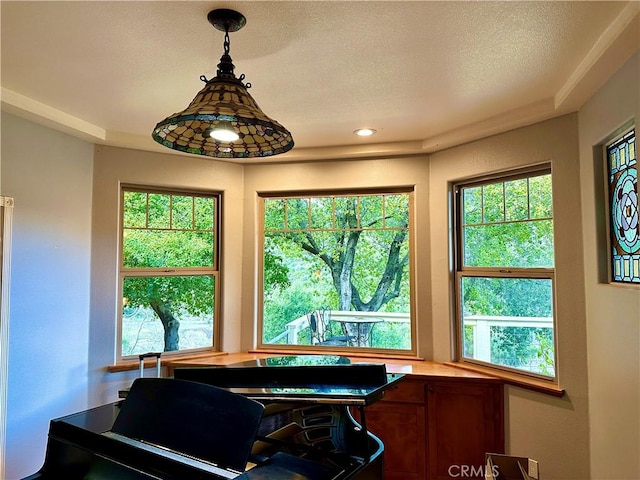 interior space featuring a textured ceiling