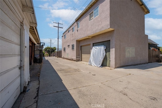 view of property exterior with a garage