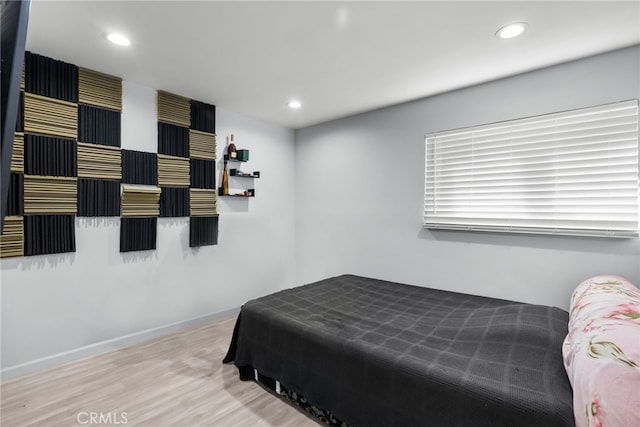 bedroom featuring light hardwood / wood-style floors