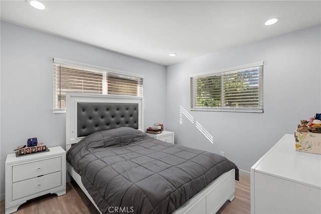 bedroom featuring hardwood / wood-style floors